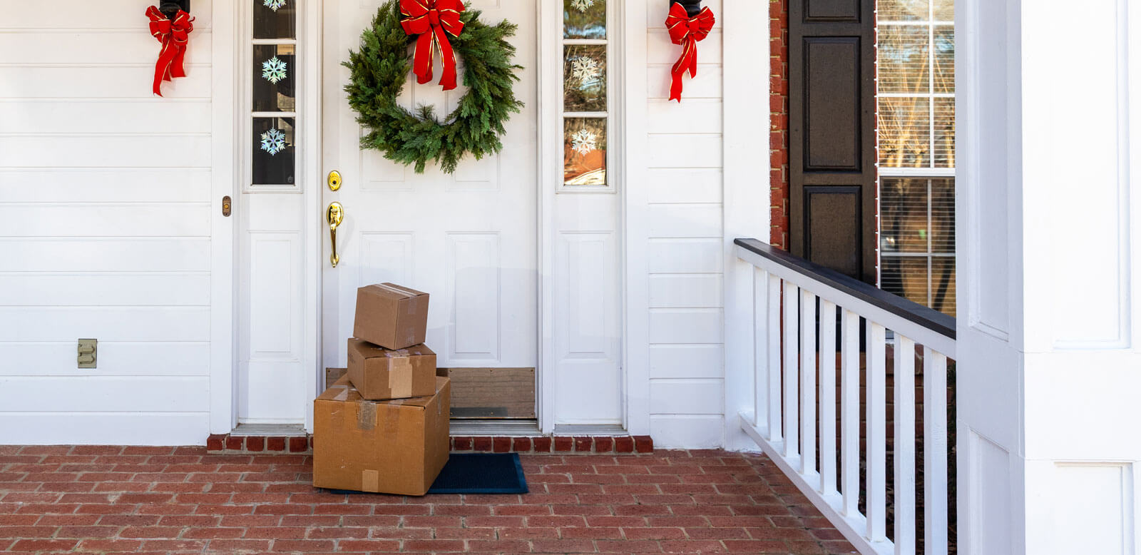 packages on a decorated porch