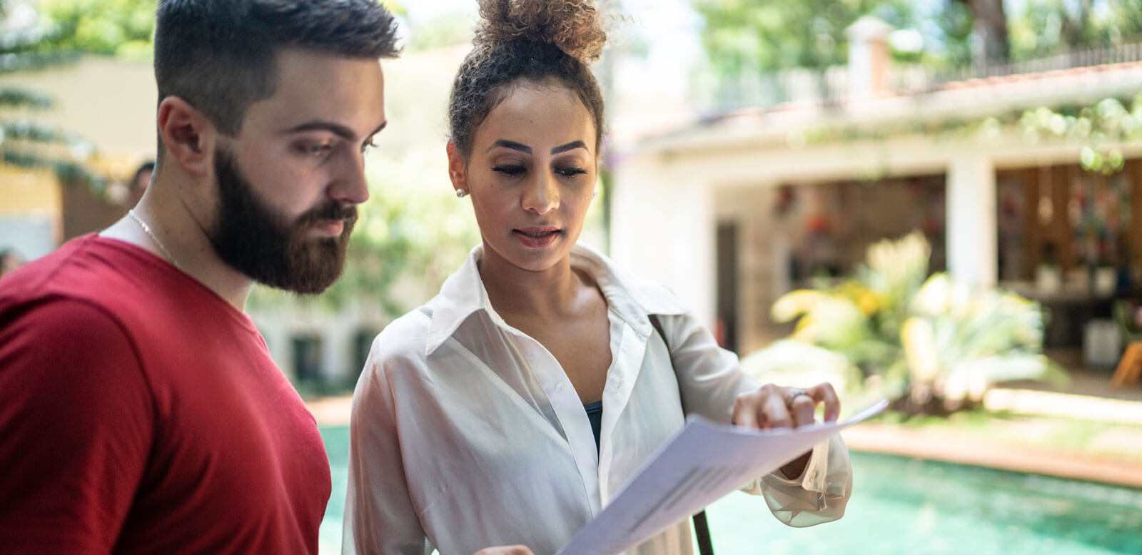 woman explaining insurance details to customer