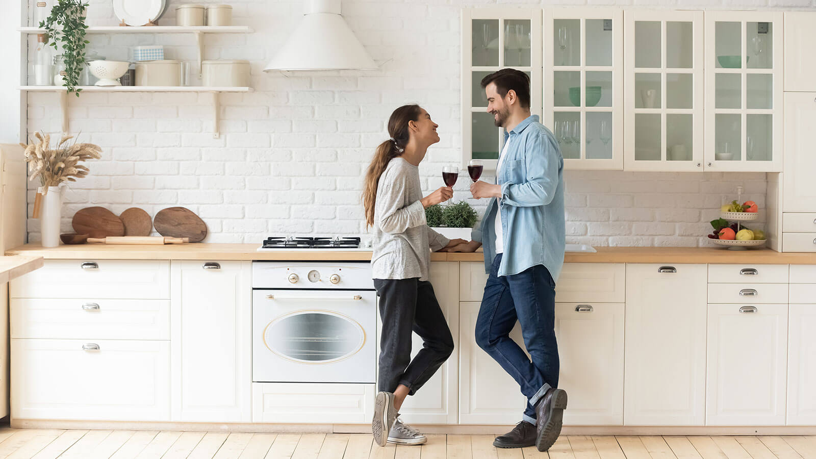 couple standing in their kitchen